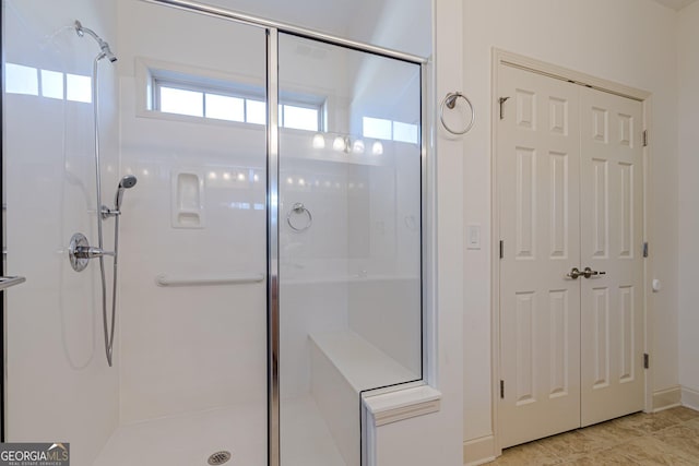 bathroom with an enclosed shower