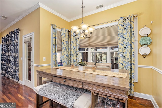 dining space featuring an inviting chandelier, dark hardwood / wood-style floors, and crown molding