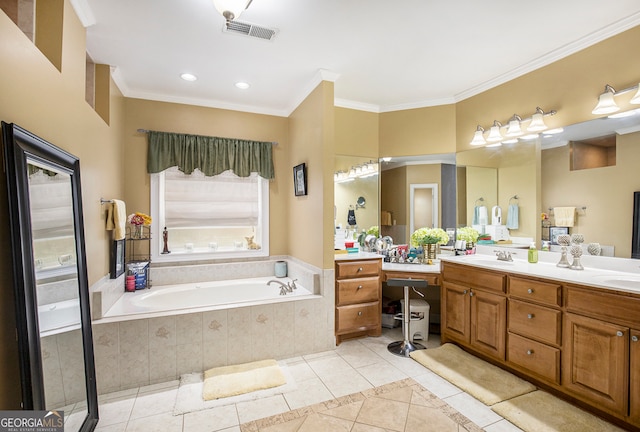 bathroom with ornamental molding, tile patterned flooring, vanity, and tiled bath