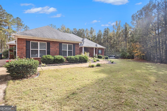 exterior space with a front yard