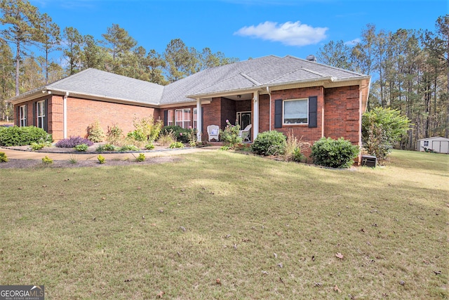 single story home with a front yard