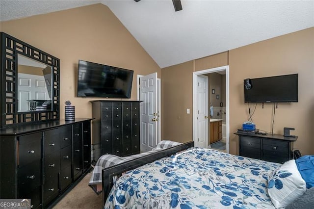 carpeted bedroom with lofted ceiling, ensuite bathroom, and ceiling fan