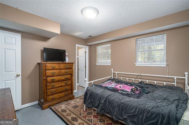 bedroom with a textured ceiling