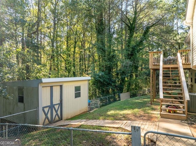 view of outbuilding featuring central AC and a lawn