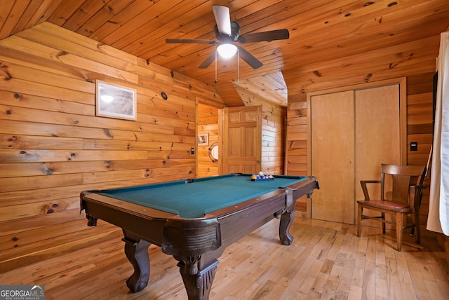 game room with wood walls, light wood-type flooring, ceiling fan, wooden ceiling, and billiards