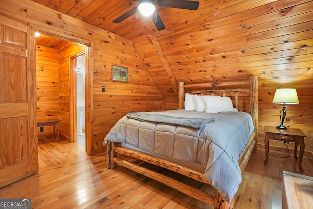 bedroom featuring lofted ceiling, wooden ceiling, light wood-type flooring, and ceiling fan