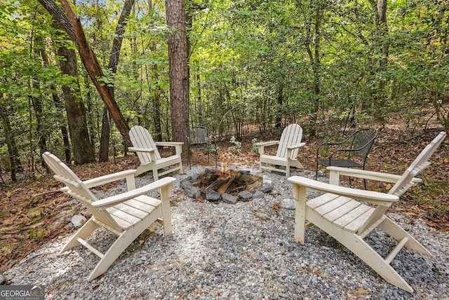 view of patio / terrace with an outdoor fire pit