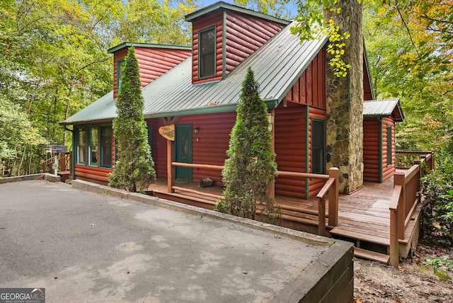 view of front of home with a deck