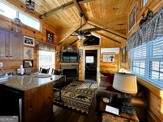 living room with wood walls, a wall mounted AC, vaulted ceiling with beams, wood ceiling, and ceiling fan