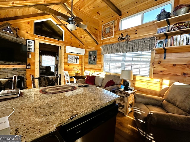 kitchen with a wall mounted air conditioner, beam ceiling, a wealth of natural light, and wooden walls