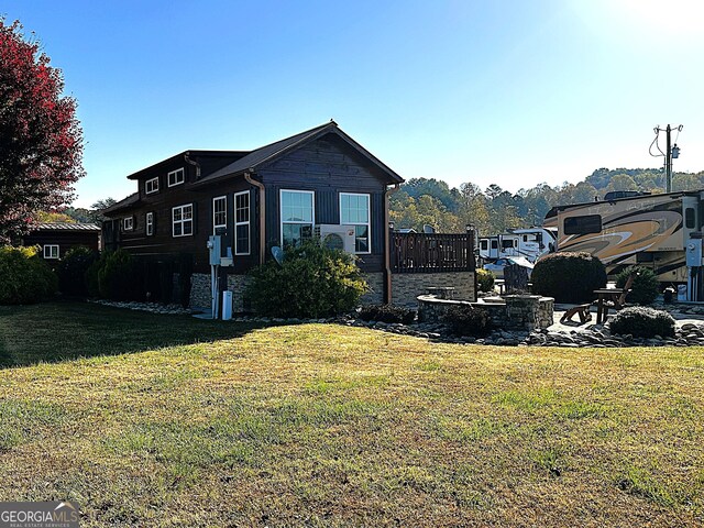 exterior space featuring a lawn