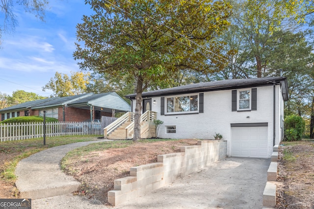 view of front of home featuring a garage