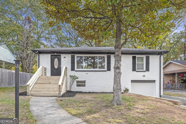 split foyer home featuring a garage