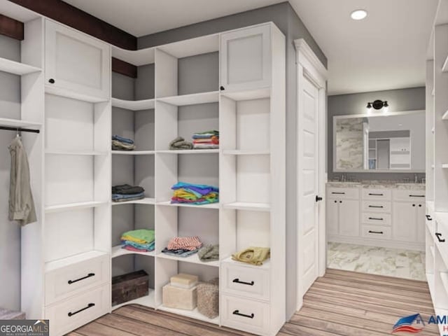 walk in closet featuring light wood-type flooring