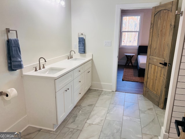 bathroom with wood-type flooring and vanity