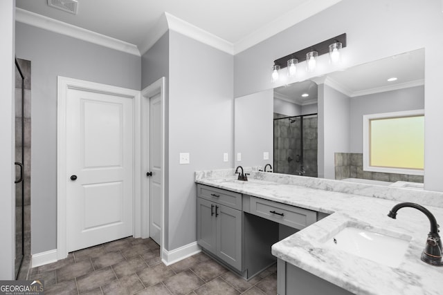 bathroom featuring ornamental molding, a shower with door, and vanity