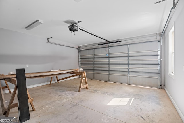 garage featuring a garage door opener