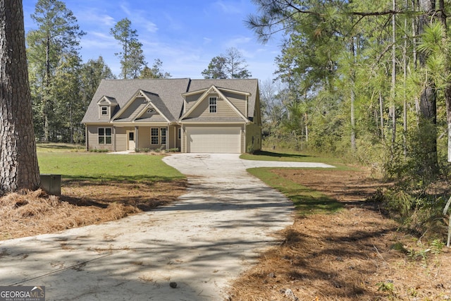 view of front of home featuring a garage and a front lawn