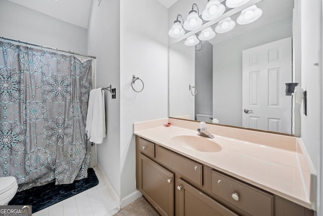 bathroom featuring a shower with curtain, vanity, and toilet