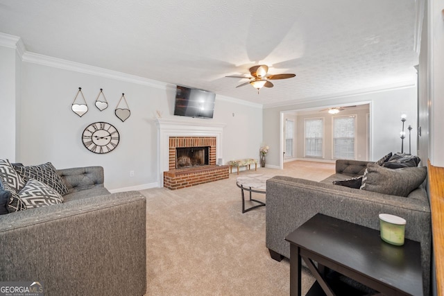 living room with light carpet, a textured ceiling, ceiling fan, crown molding, and a fireplace