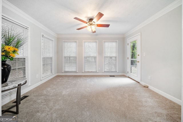 unfurnished sunroom with ceiling fan