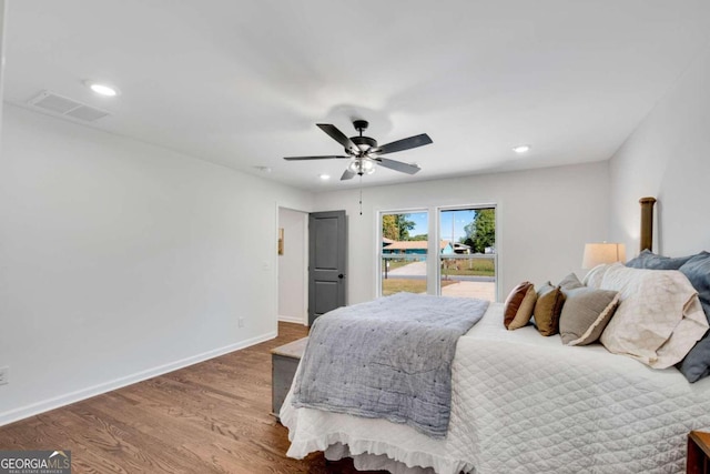 bedroom featuring ceiling fan and wood-type flooring