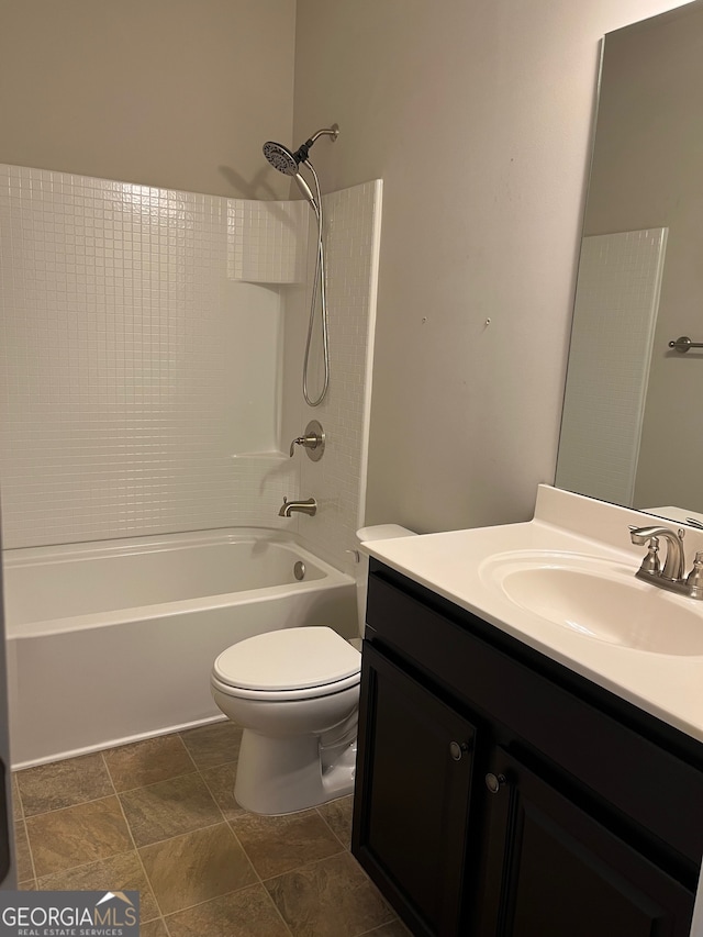 full bathroom featuring vanity, toilet, and bathing tub / shower combination