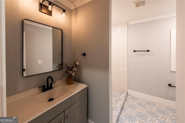 bathroom featuring vanity and tile patterned floors