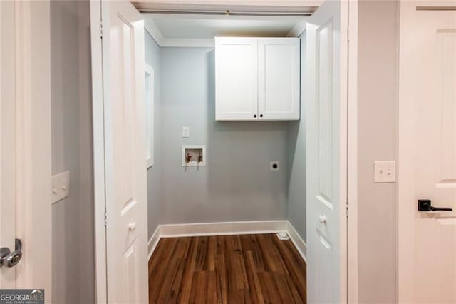 laundry area featuring hookup for an electric dryer, dark hardwood / wood-style floors, washer hookup, and cabinets