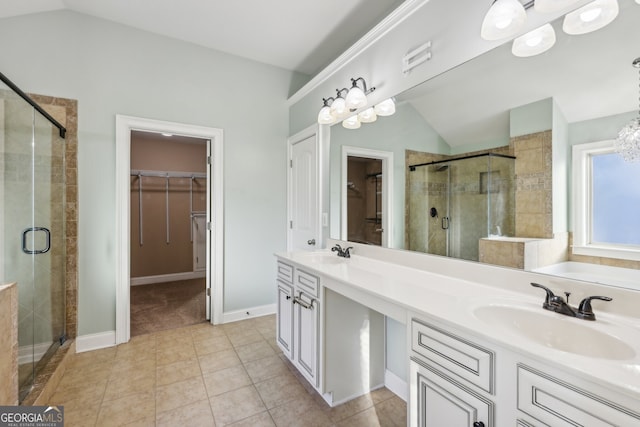 bathroom with tile patterned flooring, an enclosed shower, lofted ceiling, and vanity