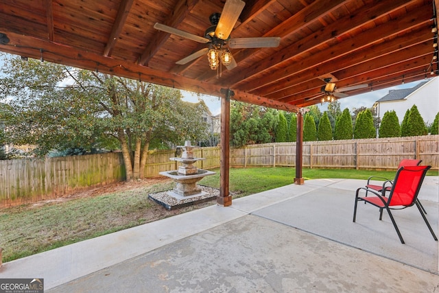 view of patio featuring ceiling fan