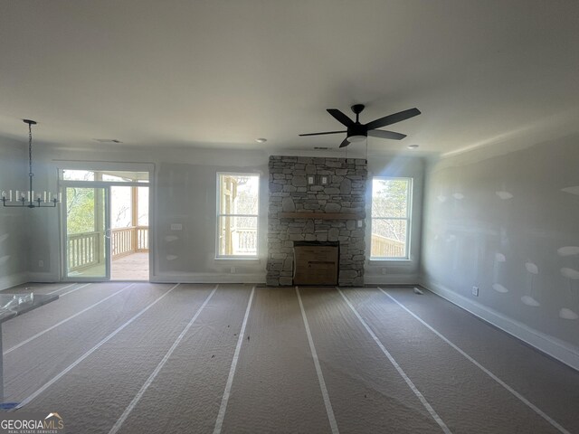 interior space with dark wood-type flooring and ceiling fan