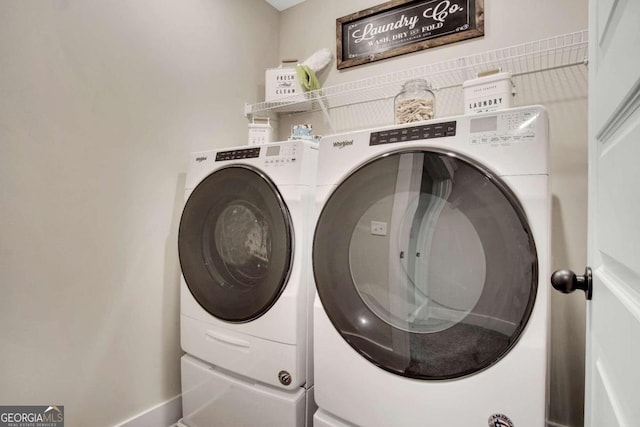 laundry room with washer and clothes dryer