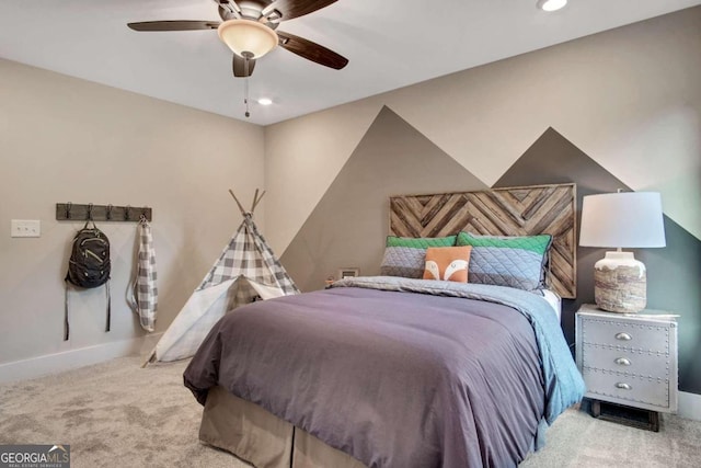 carpeted bedroom featuring ceiling fan