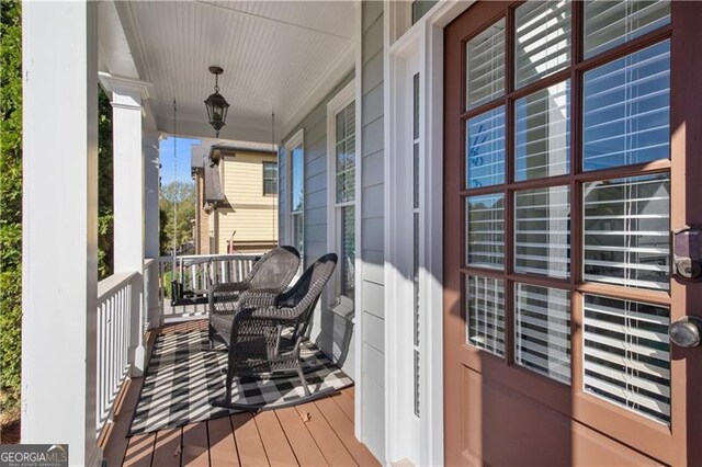 balcony featuring covered porch