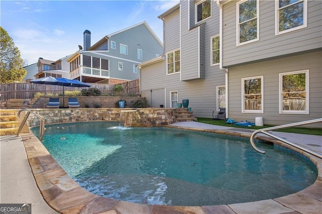 view of pool featuring pool water feature