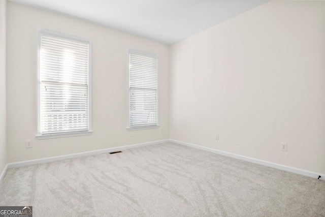 empty room with light carpet