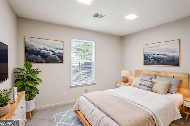 bedroom with light carpet