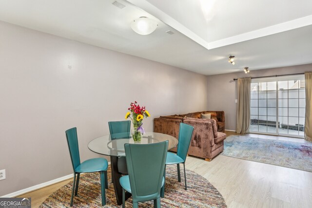 dining room featuring light wood-type flooring