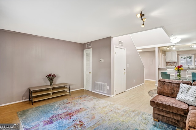 living area featuring light hardwood / wood-style floors