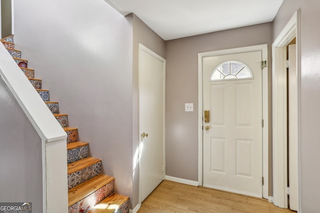 entrance foyer with light hardwood / wood-style floors