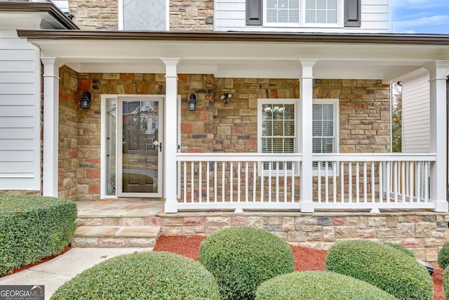 entrance to property with a porch