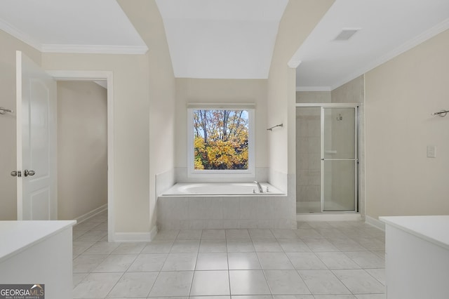 bathroom featuring ornamental molding, shower with separate bathtub, and tile patterned flooring