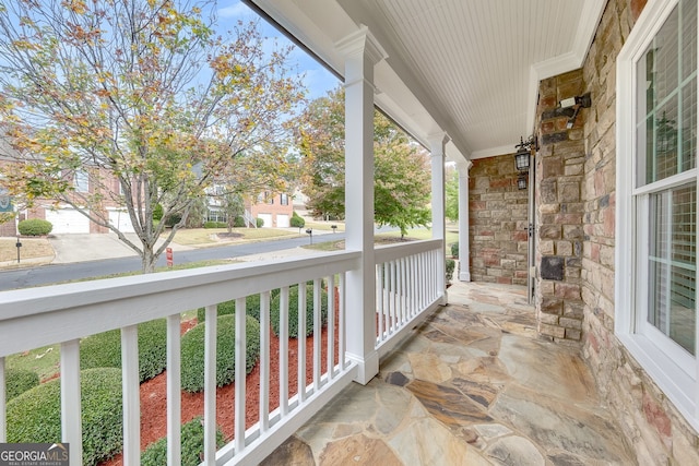 balcony featuring a porch