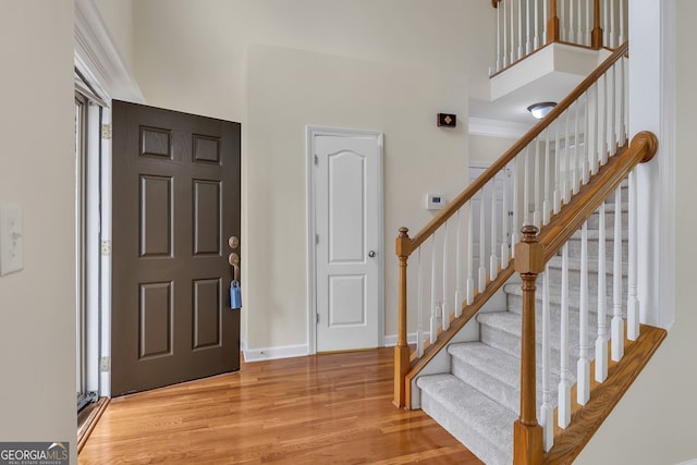 foyer entrance with light hardwood / wood-style flooring