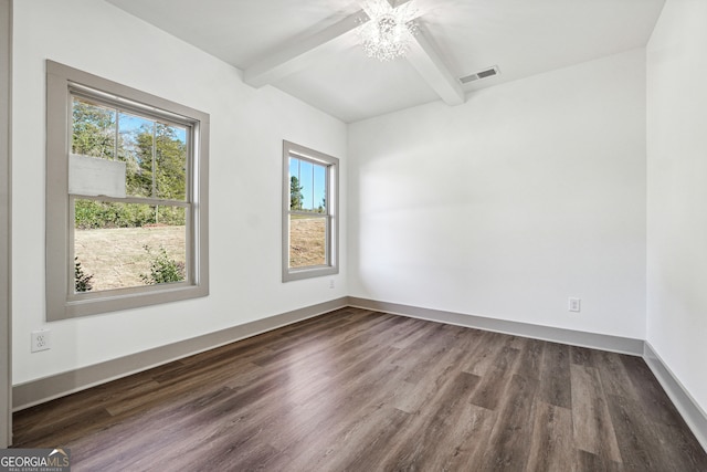 unfurnished room featuring beam ceiling and dark hardwood / wood-style flooring