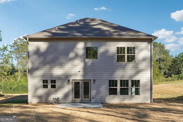 back of property featuring a patio area