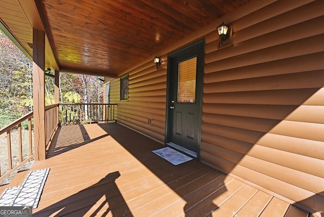 wooden deck featuring a porch