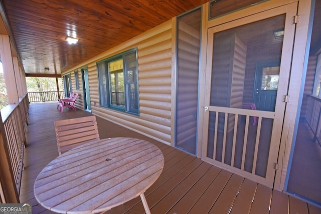 wooden deck with a porch