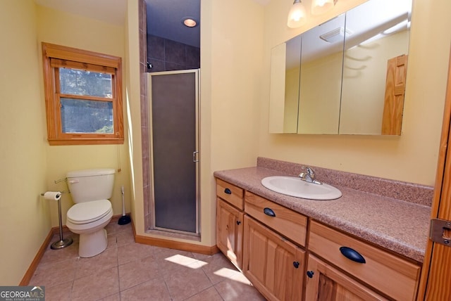 bathroom featuring vanity, toilet, tile patterned flooring, and a shower with door